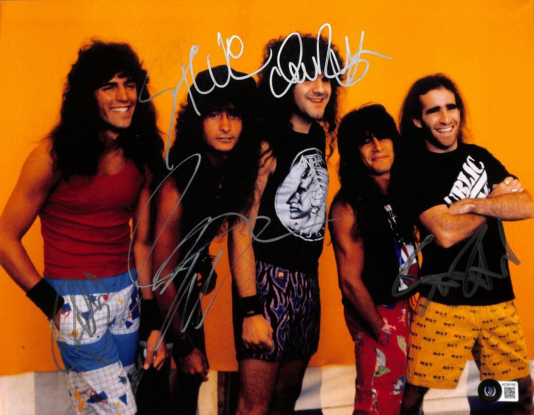 Anthrax 11x14 photo signed by 4 with Beckett LOA: Anthrax 11x14 photo signed by 4 with Beckett LOA This is a multi-signed 11x14 color photograph of the renowned heavy metal band Anthrax. The photograph features vivid imagery of the band and has been 