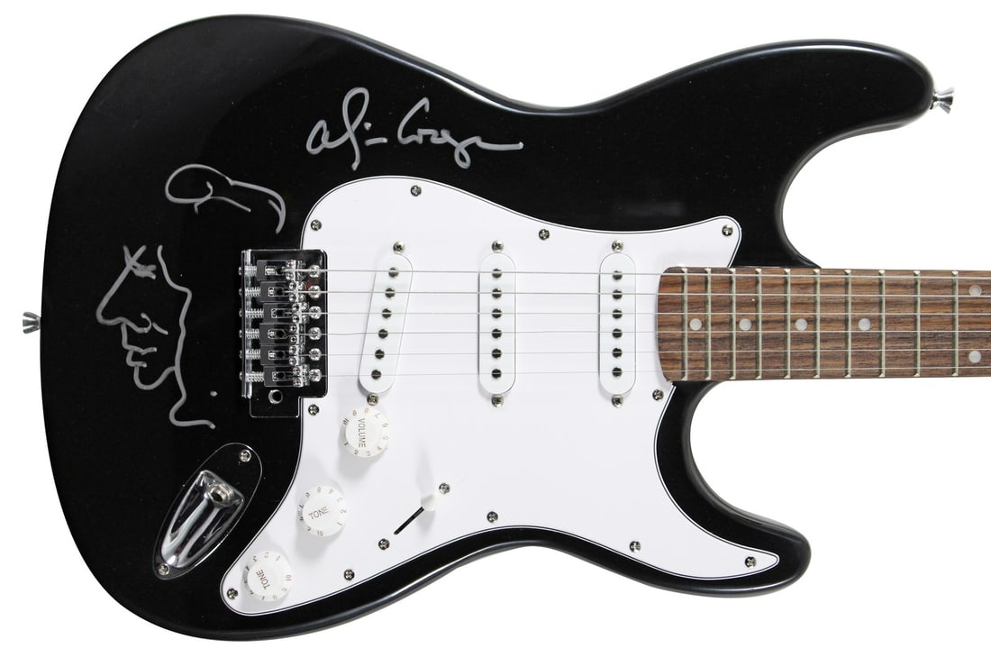 Alice Cooper Signed Black Electric Guitar with Self Portrait BAS Authenticated: Alice Cooper Signed Black Electric Guitar with Self Portrait BAS Authenticated This authentic black electric guitar has been personally signed by the legendary Alice Cooper, complete with a self-portr