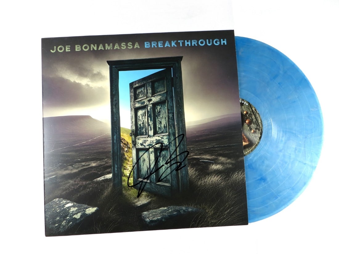 Autographed Breakthrough Album Cover by Joe Bonamassa Beckett Authenticated: Autographed Breakthrough Album Cover by Joe Bonamassa Beckett Authenticated This is an original record album cover autographed by Joe Bonamassa, authenticated by Beckett Authentication Services. The a