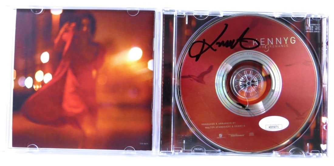 Kenny G Rhythm and Romance CD Signed with JSA Authentication: Kenny G Rhythm and Romance CD Signed with JSA Authentication This is an original "Rhythm and Romance" compact disc (CD) autographed by Kenny G. The autograph has been authenticated by James Spence