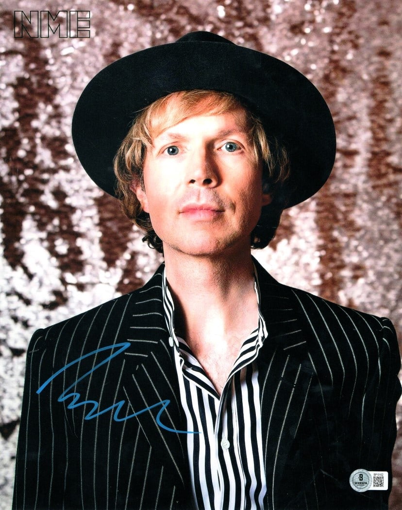 Beck Hansen Autographed 11x14 Photo Striped Suit Beckett Authentic: Beck Hansen Autographed 11x14 Photo Striped Suit Beckett Authentic This striking 11x14 photograph features Beck Hansen, known for his unique style, captured in a close-up while wearing his signature s