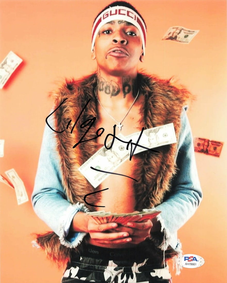 PSA DNA autographed 8x10 Lil Got It photo: PSA DNA autographed 8x10 Lil Got It photo This is a professionally printed 8x10 photograph signed by Lil Got It. The autograph has been authenticated by PSA/DNA, ensuring its legitimacy. The photo is 