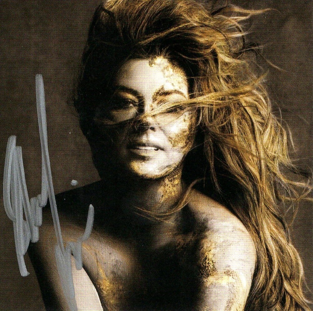 Shania Twain Queen of Me Signed Art Card Photo JSA Authenticated: Shania Twain Queen of Me Signed Art Card Photo JSA Authenticated This is an original autographed art card photo of Shania Twain, measuring approximately 3.75" x 4". The autograph has been authenticate