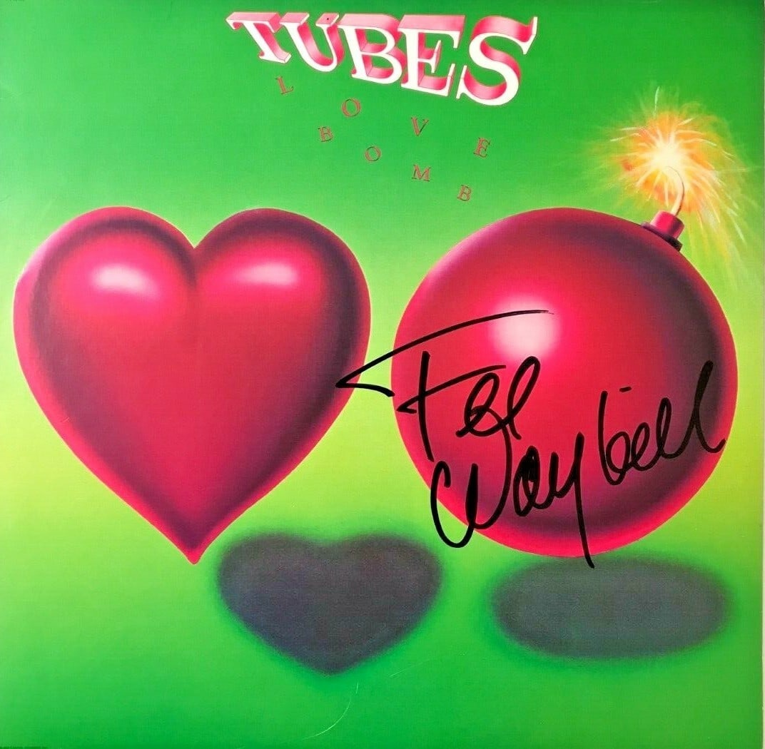 Fee Waybill Signed Love Bomb Vinyl Album The Tubes Authentic: Fee Waybill Signed Love Bomb Vinyl Album The Tubes Authentic This is a signed copy of the "Love Bomb" album by Fee Waybill, the lead singer of The Tubes. The album features an authentic black Sharpie 
