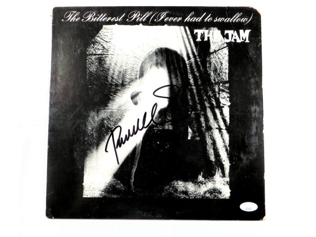 Paul Weller Signed Album Cover The Jam Bitterest Pill JSA Authenticated: Paul Weller Signed Album Cover The Jam Bitterest Pill JSA Authenticated This is a Paul Weller signed album cover from The Jam, featuring the classic track 'Bitterest Pill'. The album cover is an origi