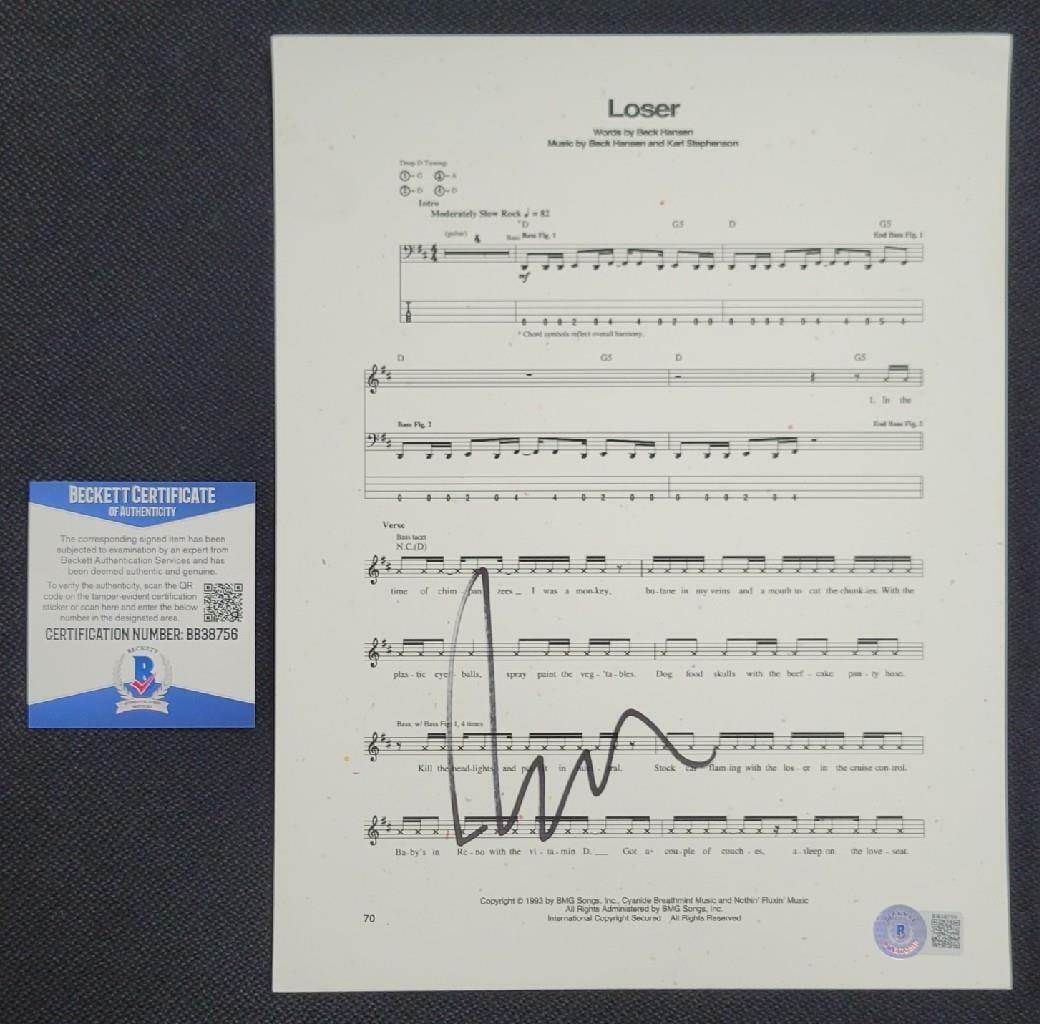 Signed Loser Lyrics Sheet Autographed by Beck Hansen Beckett Authenticated: Signed Loser Lyrics Sheet Autographed by Beck Hansen Beckett Authenticated This is an original lyric song sheet for 'Loser' signed by Beck Hansen. The autograph has been authenticated by Beckett. The 