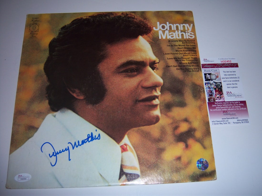 Johnny Mathis Signed Vinyl LP with JSA COA: Johnny Mathis Signed Vinyl LP with JSA COA This is an original self-titled LP record album by Johnny Mathis, signed on the cover. The album is a pre-owned item from the United States and features John