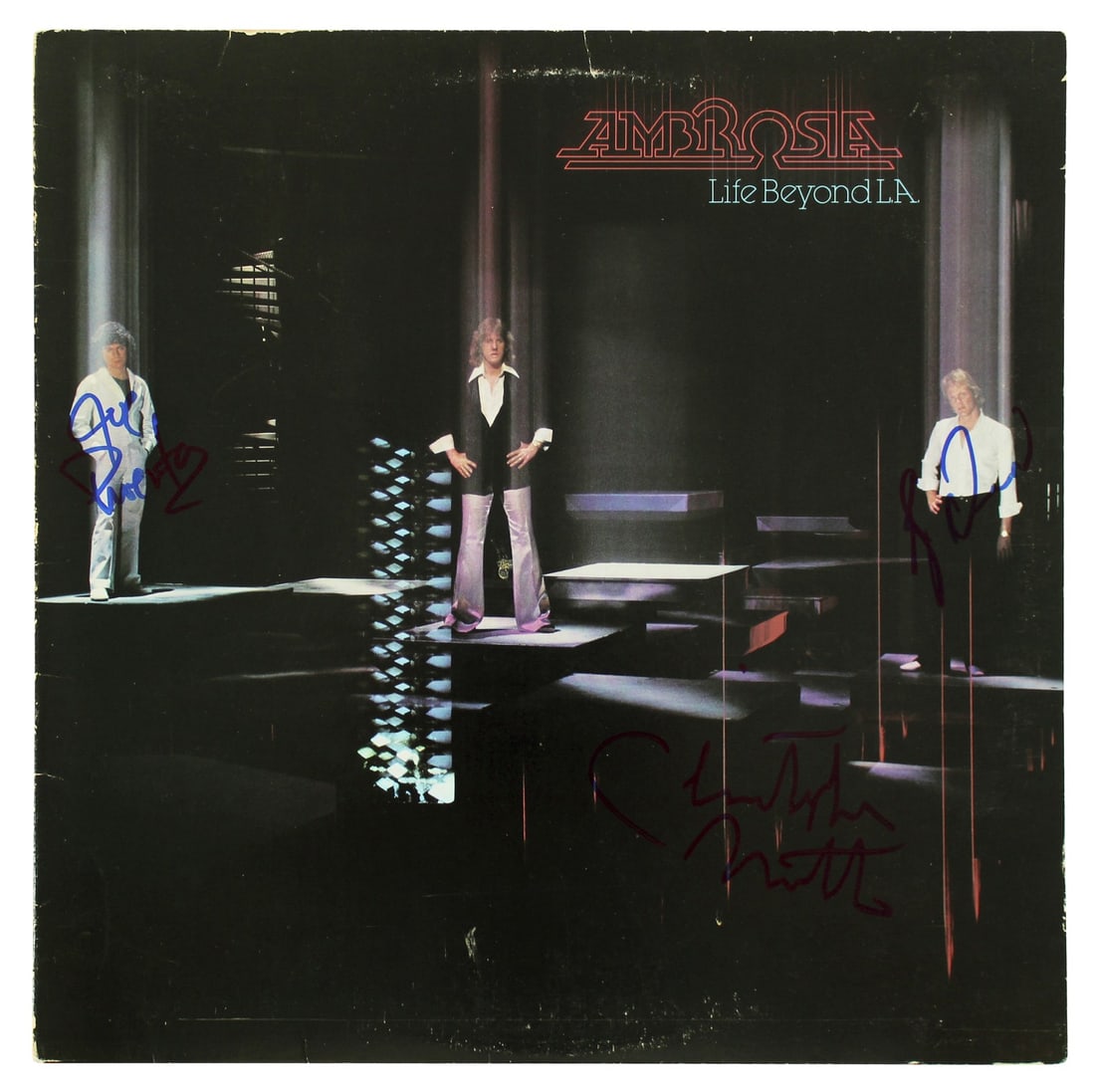 Life Beyond L.A. Album Cover Signed by Ambrosia Members Beckett COA: Life Beyond L.A. Album Cover Signed by Ambrosia Members Beckett COA This is a pre-owned "Life Beyond L.A." album cover, personally signed by Joe Puerta, Burleigh Drummond, and Christopher North of Amb