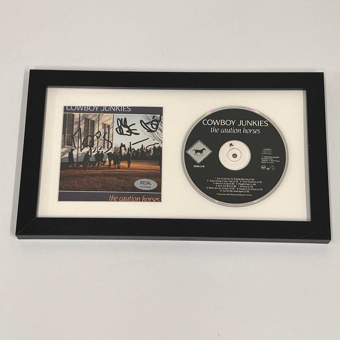 Margo Timmins Signed The Caution Horses CD Cover Framed PSA-DNA Authenticated: Margo Timmins Signed The Caution Horses CD Cover Framed PSA-DNA Authenticated This listing features a framed CD album cover of "The Caution Horses" signed by Margo Timmins. The signature has been auth