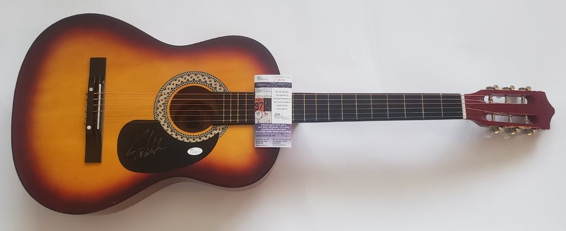 Joe Nichols Signed Acoustic Guitar Authentic JSA Certification: Joe Nichols Signed Acoustic Guitar Authentic JSA Certification This is an authentic acoustic guitar hand-signed by country star Joe Nichols, offering a unique piece for any music or memorabilia collec