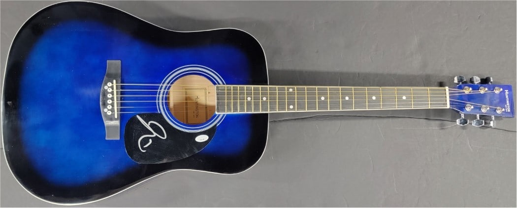Taylor Hawkins Autographed Guitar Signed in Silver Ink JSA Certified: Taylor Hawkins Autographed Guitar Signed in Silver Ink JSA Certified Own a piece of music history with this authentically signed guitar by Taylor Hawkins, the legendary drummer known for his work with