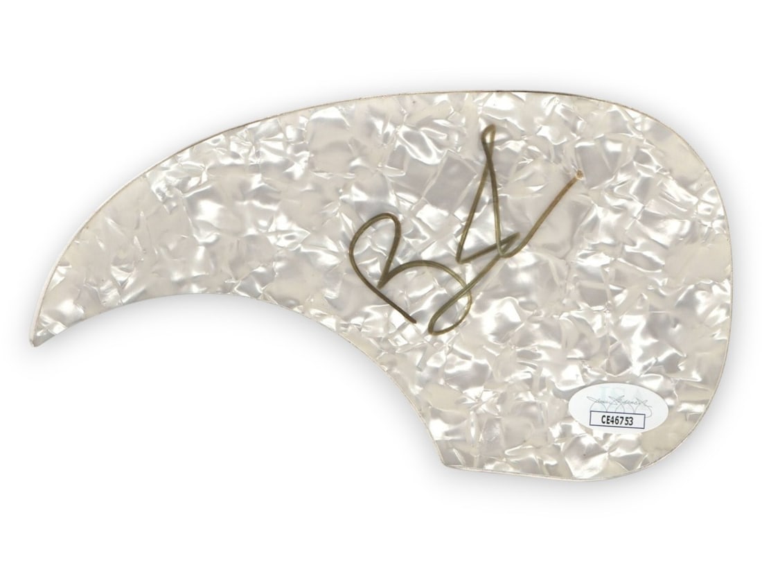 Ben Folds JSA Autographed Acoustic Guitar Pickguard: Ben Folds JSA Autographed Acoustic Guitar Pickguard This is an original acoustic guitar pickguard autographed by singer-songwriter Ben Folds. The pickguard has been authenticated by James Spence Authe