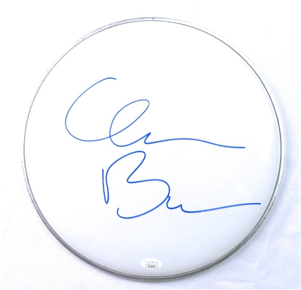 Clem Burke Autographed 12 Inch Drumhead Blondie JSA Certified: Clem Burke Autographed 12 Inch Drumhead Blondie JSA Certified This is an original 12" drumhead autographed by Clem Burke, the renowned drummer of the iconic band Blondie. The autograph has been authen