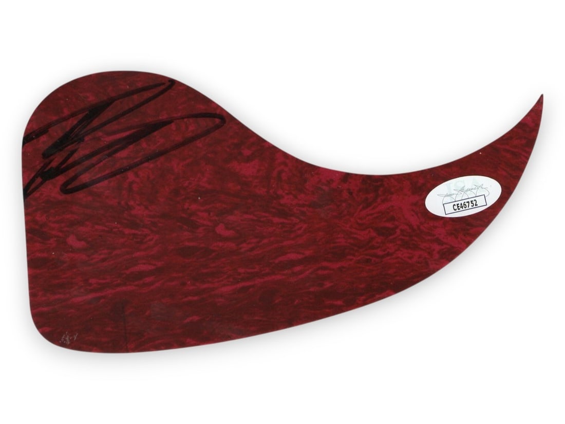 Easton Corbin Autographed Guitar Pickguard JSA Certified: Easton Corbin Autographed Guitar Pickguard JSA Certified Own a piece of music memorabilia with this Easton Corbin signed guitar pickguard. This authentic item has been autographed by the renowned coun
