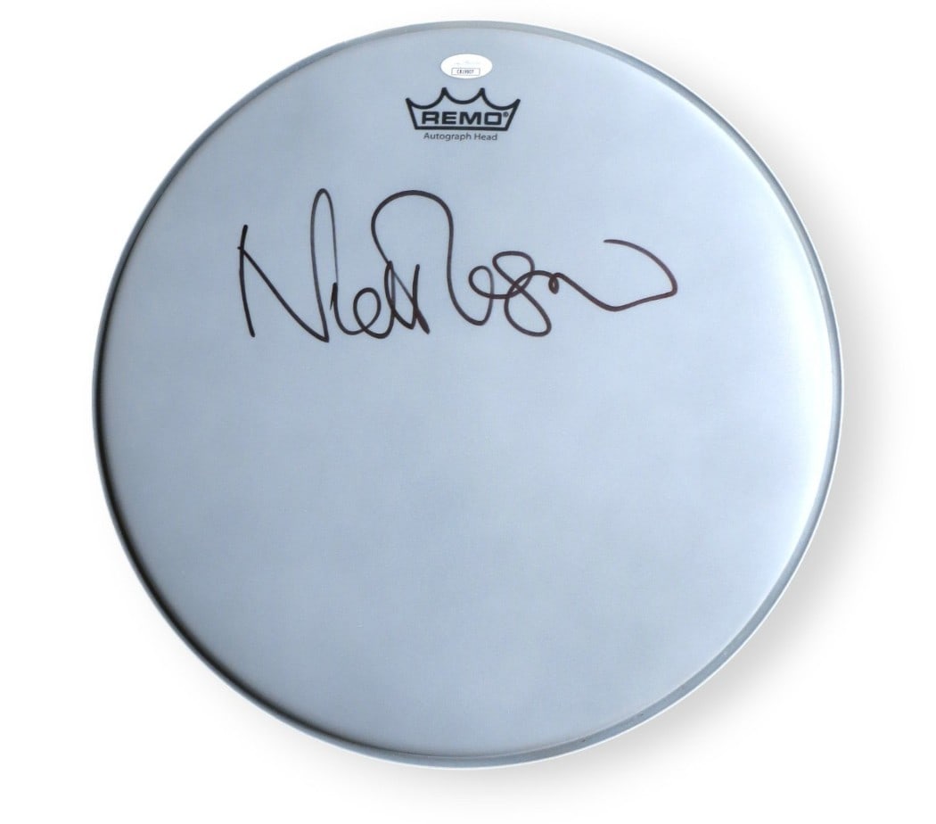 Nick Mason Signed 14 Inch Drumhead Pink Floyd JSA Authenticated: Nick Mason Signed 14 Inch Drumhead Pink Floyd JSA Authenticated This authentic 14" drumhead has been personally signed by Nick Mason, the renowned drummer of Pink Floyd. The signature comes with the a