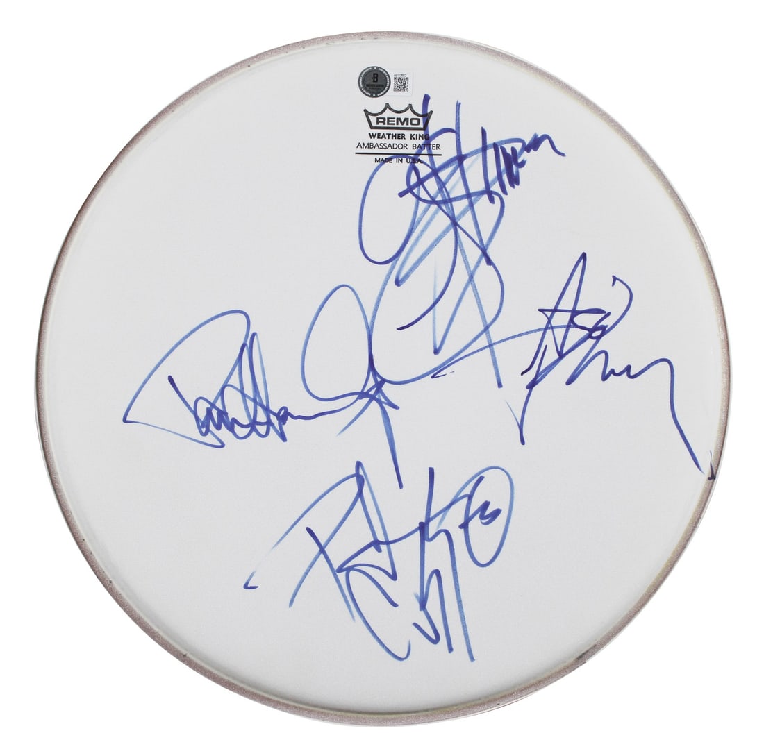 KISS Signed 13 Inch Drum Head by Simmons Frehley Stanley Criss BAS AE02883: KISS Signed 13 Inch Drum Head by Simmons Frehley Stanley Criss BAS AE02883 This original 13-inch Remo drum head is a must-have for any KISS fan and collector. Personally signed by all four iconic memb