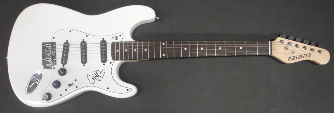 Autographed Guitar Signed by Cassadee Pope with Global Authentics COA: Autographed Guitar Signed by Cassadee Pope with Global Authentics COA This is a pre-owned guitar and guitar pick set hand signed by Cassadee Pope. The autograph has been authenticated by Global Authen