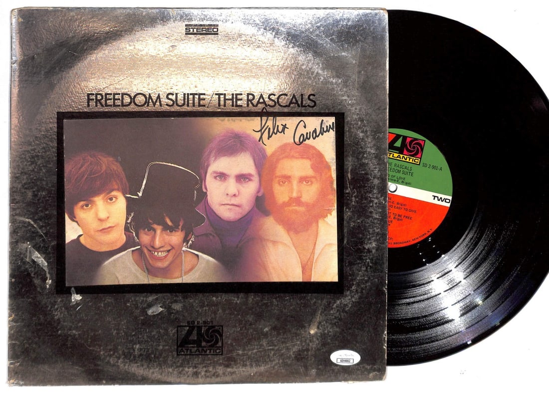 Felix Cavaliere Signed The Rascals Freedom Suite Album JSA: Felix Cavaliere Signed The Rascals Freedom Suite Album JSA This is an original album titled "Freedom Suite" by The Rascals, autographed by Felix Cavaliere. The signature has been authenticated by Jame