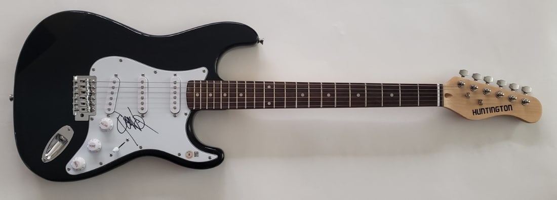 Beckett Authenticated Quavo Signed Electric Guitar Migos Hip Hop: Beckett Authenticated Quavo Signed Electric Guitar Migos Hip Hop This electric guitar has been hand signed by Quavo of Migos, making it a unique collectible for hip hop fans. The guitar comes with a c