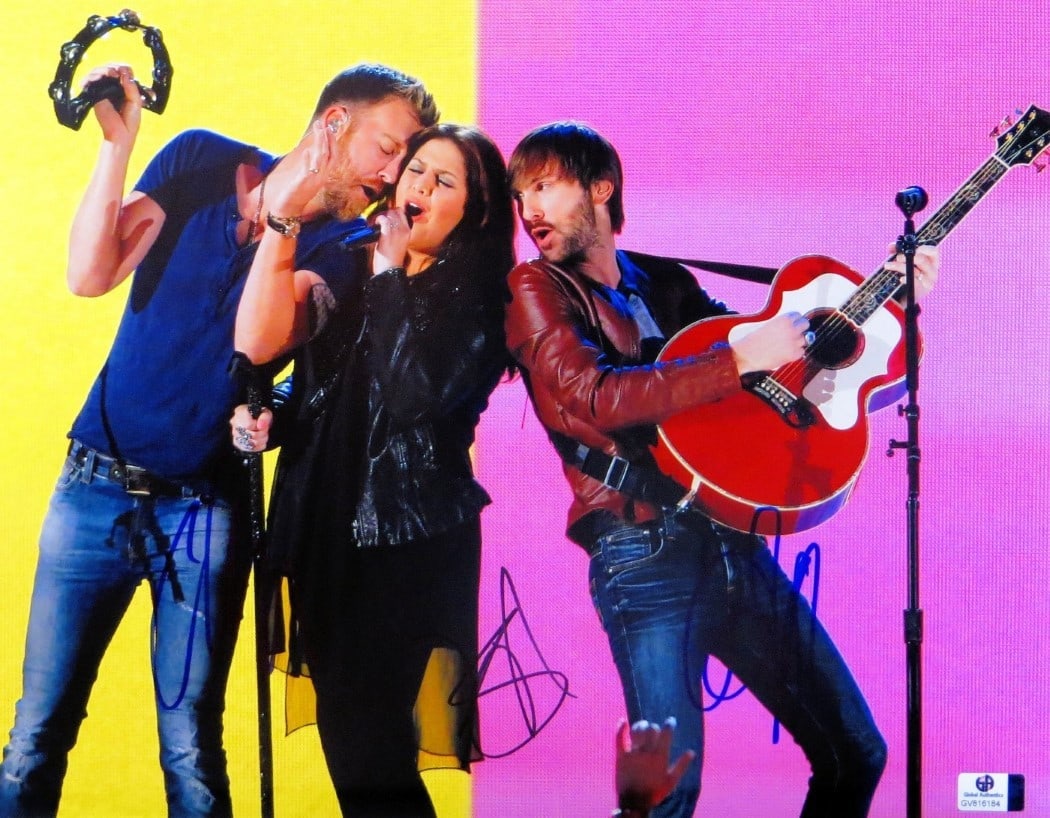 Lady Antebellum Scott Kelley Haywood Signed 11x14 Photo Authenticated by GAI: Lady Antebellum Scott Kelley Haywood Signed 11x14 Photo Authenticated by GAI Celebrate the iconic country music trio with this autographed 11X14 photo of Lady Antebellum, featuring the signatures of b