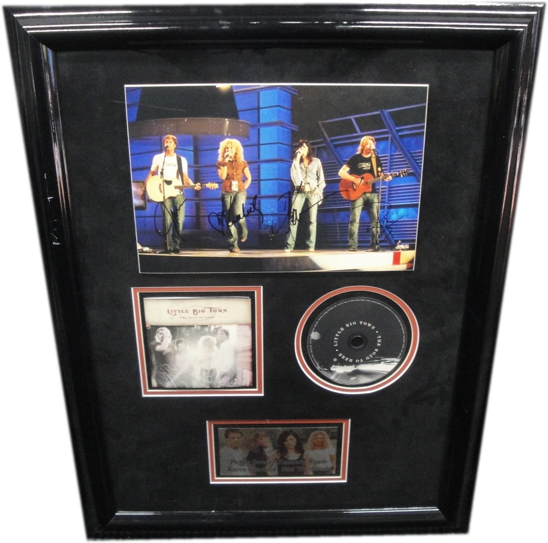 Little Big Town Signed 11x14 Photo Authenticated by GAI: Little Big Town Signed 11x14 Photo Authenticated by GAI This is an authentic, autographed 11x14 photo of the country music group Little Big Town, featuring signatures from all four members: Karen Fair