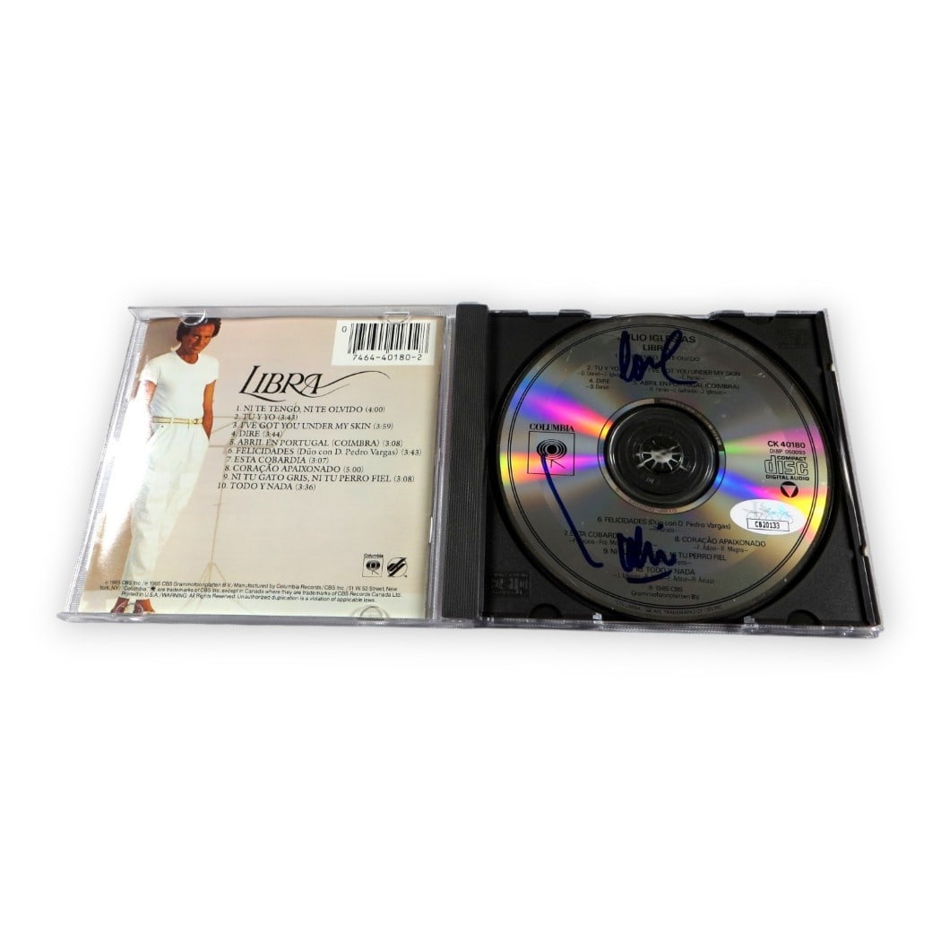 Julio Iglesias Autographed Libra CD With JSA Authentication: Julio Iglesias Autographed Libra CD With JSA Authentication This is an original CD and booklet for "Libra" autographed by Julio Iglesias. The autograph has been authenticated by James Spence Authentic