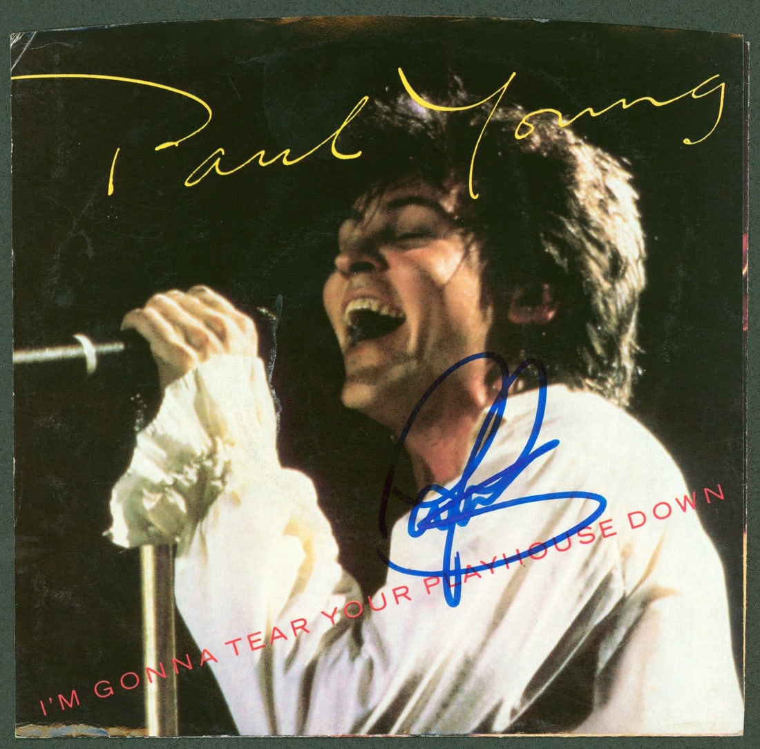 Beckett Authenticated Paul Young Signed 45 RPM Cover: Beckett Authenticated Paul Young Signed 45 RPM Cover This is a pre-owned 45 RPM album cover for "I'm Gonna Tear Your Playhouse Down" that has been personally signed by Paul Young. The item does not in