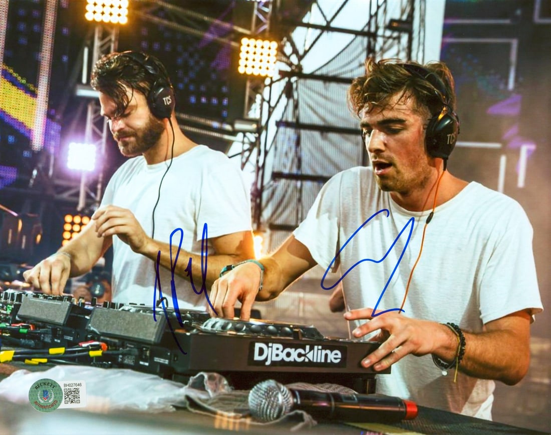 Beckett authenticated 8x10 photo signed by The Chainsmokers: Beckett authenticated 8x10 photo signed by The Chainsmokers This 8x10 photograph features the authentic signatures of Drew Taggart and Alex Pall from The Chainsmokers. The item is an original autograp