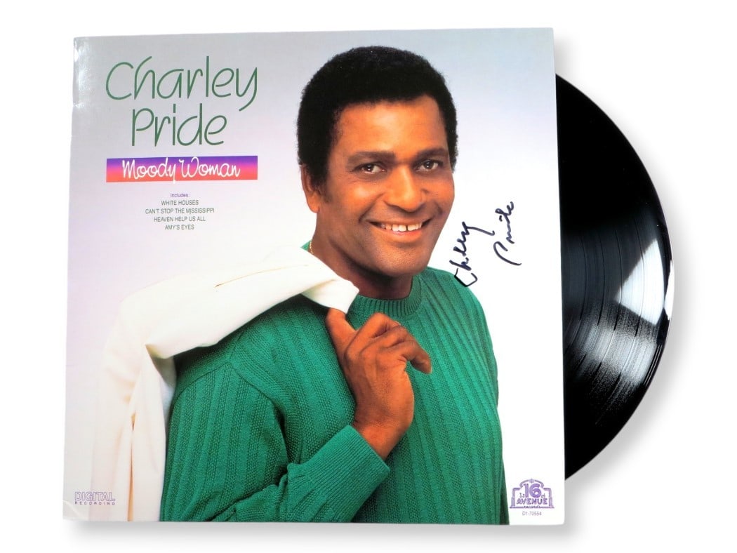 Charley Pride Autographed Record Album Cover Beckett Authenticated: Charley Pride Autographed Record Album Cover Beckett Authenticated This is an original signed album cover by Charley Pride, featuring the iconic artwork for the record "Moody Woman." The album cover i