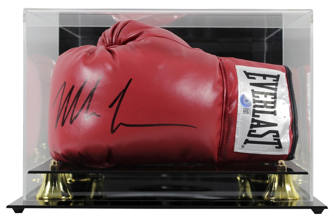 Mike Tyson Signed Red Everlast Boxing Glove with Beckett Authentication: Mike Tyson Signed Red Everlast Boxing Glove with Beckett Authentication This authentic signed red Everlast left-hand boxing glove by Mike Tyson is a must-have for any boxing enthusiast or collector. P
