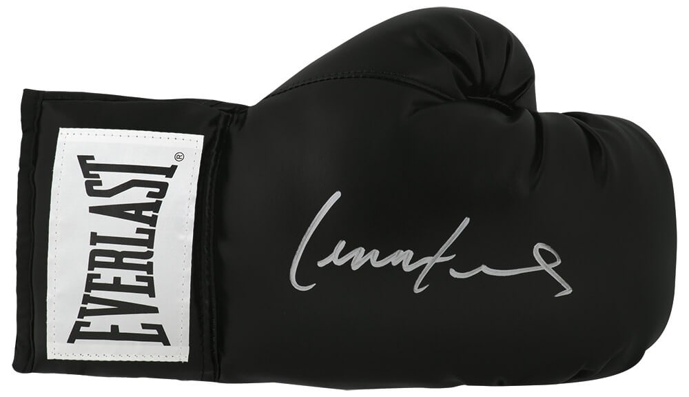 Lennox Lewis Signed Everlast Boxing Glove with COA: Lennox Lewis Signed Everlast Boxing Glove with COA This is a black full-size boxing glove signed by Lennox Lewis, a renowned heavyweight champion and Hall of Famer. The glove features a tamper-proof n