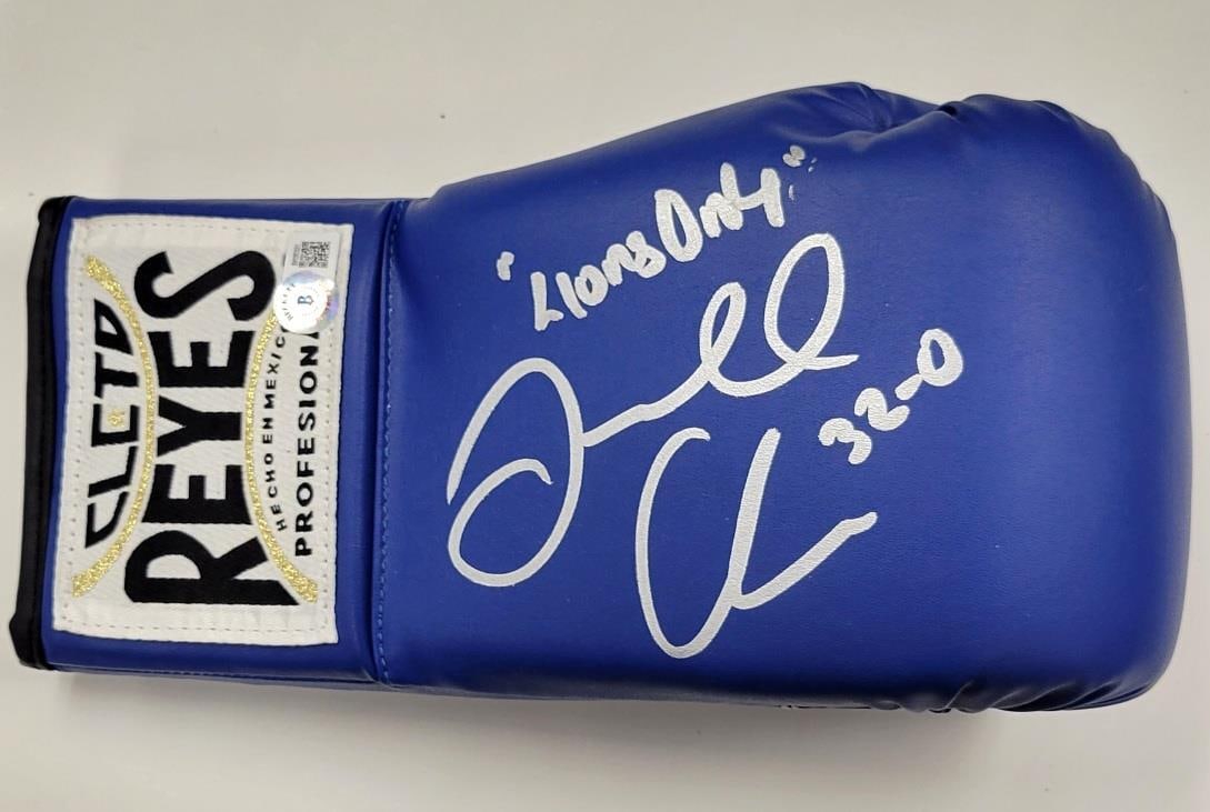 Jermall Charlo Autographed Boxing Glove 32-0 Lions Only Beckett BAS: Jermall Charlo Autographed Boxing Glove 32-0 Lions Only Beckett BAS This is an original boxing glove signed by professional boxer Jermall Charlo, featuring the inscription "32-0, Lions Only". The glov