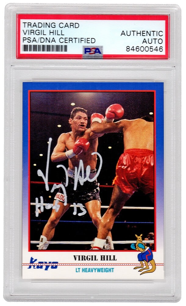 Virgil Hill Signed 1991 Kayo Boxing Card #101 HOF 13 PSA/DNA: Virgil Hill Signed 1991 Kayo Boxing Card #101 HOF 13 PSA/DNA Celebrate the legacy of boxing with this signed 1991 Kayo trading card featuring Virgil Hill, inscribed with 'HOF 13'. This card is a testa