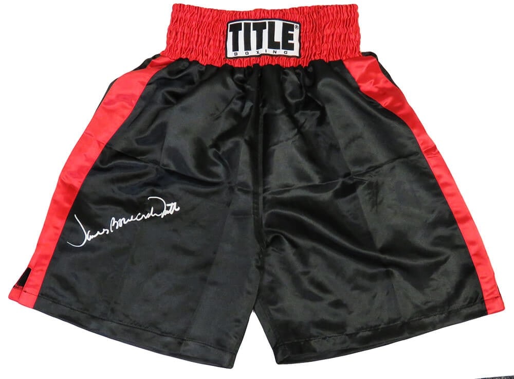 James Smith Signed Boxing Trunks Black Red Trim with Bonecrusher COA: James Smith Signed Boxing Trunks Black Red Trim with Bonecrusher COA Own a piece of boxing history with these James Smith signed Title boxing trunks, featuring a striking black design with red trim. T