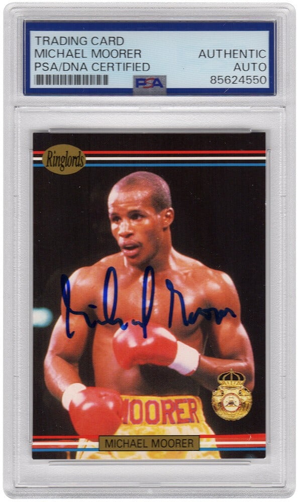 Michael Moorer Signed 1991 Ringlords Boxing Card #14 PSA Encapsulated: Michael Moorer Signed 1991 Ringlords Boxing Card #14 PSA Encapsulated This is a signed 1991 Ringlords boxing trading card #14 featuring Michael Moorer, a notable heavyweight champion. The card is enca