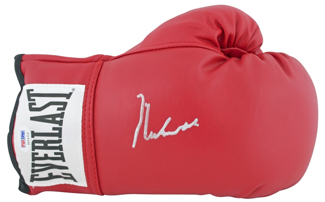 Red Everlast Boxing Glove Signed by Muhammad Ali PSA DNA Certified: Red Everlast Boxing Glove Signed by Muhammad Ali PSA DNA Certified This red Everlast boxing glove has been personally signed by Muhammad Ali. The autograph is authenticated by PSA/DNA and includes a c