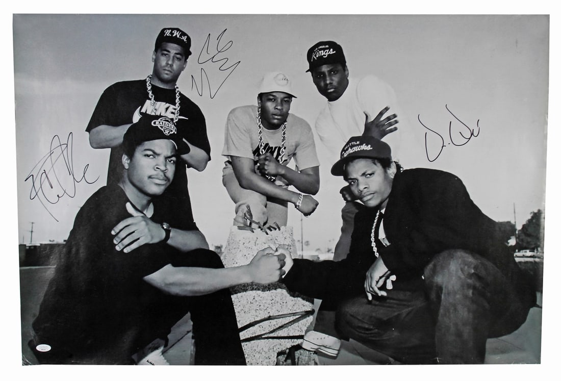 Autographed 24x36 N.W.A Photo Signed by Dr. Dre Ice Cube DJ Yella JSA Authenticated: Autographed 24x36 N.W.A Photo Signed by Dr. Dre Ice Cube DJ Yella JSA Authenticated This 24x36 photo has been personally signed by Dr. Dre, Ice Cube, and DJ Yella from N.W.A. The autographs are authen