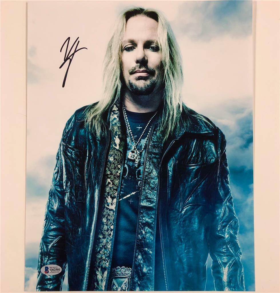 Vince Neil Signed 11x14 Photograph Beckett Authenticated Motley Crue Lead Vocalist: Vince Neil Signed 11x14 Photograph Beckett Authenticated Motley Crue Lead Vocalist This original 11x14 photograph is autographed by Vince Neil, the lead singer of Motley Crue. The autograph is authent