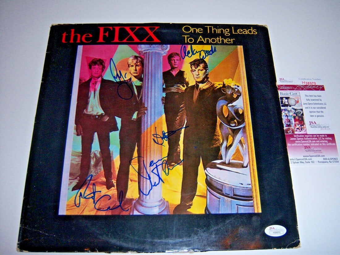 The Fixx signed LP One Thing Leads to Another JSA COA: The Fixx signed LP One Thing Leads to Another JSA COA This is an original LP record album of The Fixx titled "One Thing Leads to Another," signed by five individuals. The album is accompanied by a JSA
