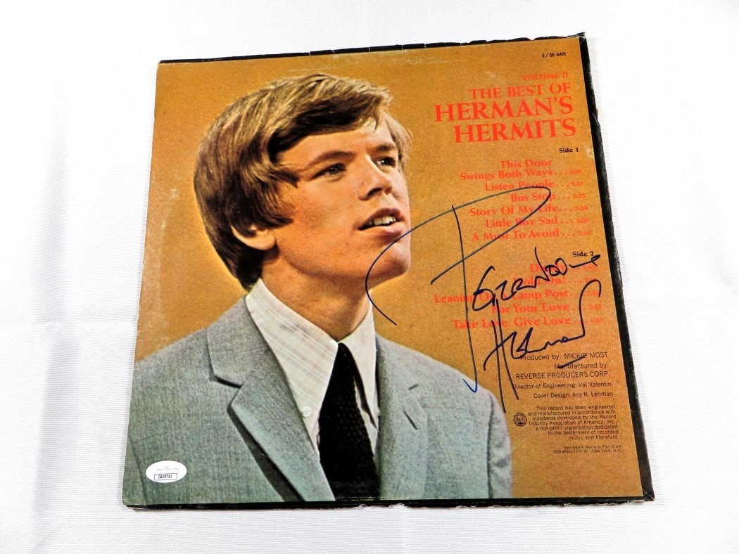 Peter Noone Signed Album Back Cover Herman's Hermits JSA Certified: Peter Noone Signed Album Back Cover Herman's Hermits JSA Certified This is the back cover of an album signed by Peter Noone, the lead singer of Herman's Hermits. The autograph has been authenticated b