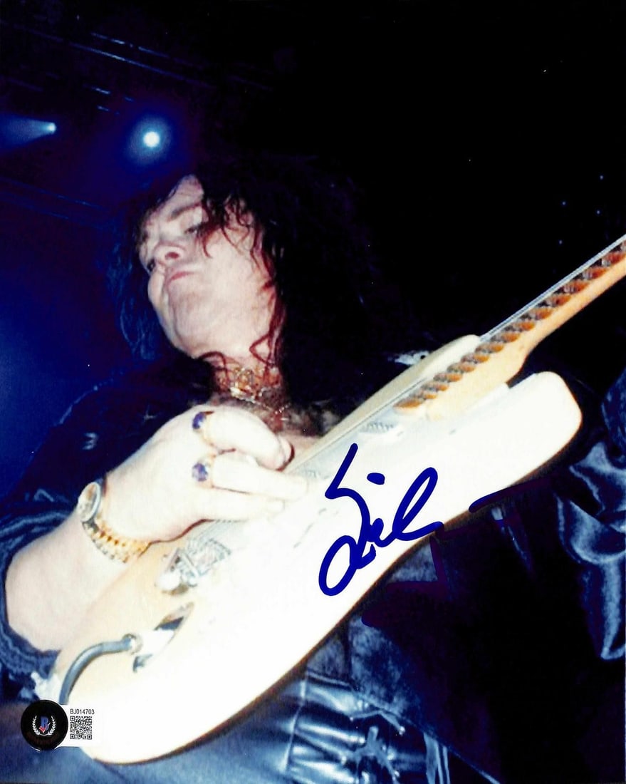 Beckett authenticated Yngwie Malmsteen 8x10 concert photo signed: Beckett authenticated Yngwie Malmsteen 8x10 concert photo signed This 8x10 color concert photograph features legendary guitarist Yngwie Malmsteen performing live on stage and has been personally hand-