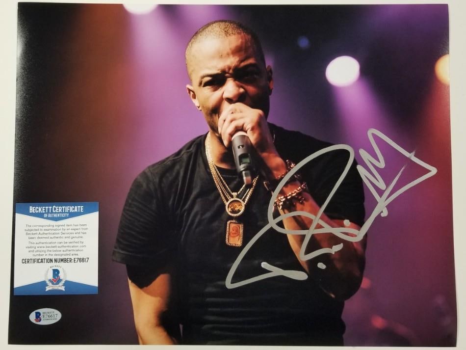 Autographed 11x14 T.I. Photograph with Beckett BAS Certificate: Autographed 11x14 T.I. Photograph with Beckett BAS Certificate This original 11x14 photo is signed by T.I. Clifford Harris Jr., the renowned hip hop artist and rapper. The autograph comes certified by