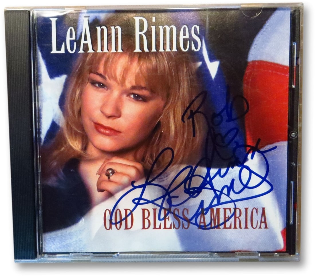 LeAnn Rimes Autographed CD Cover God Bless America Global Authentics: LeAnn Rimes Autographed CD Cover God Bless America Global Authentics This is an original autographed CD cover of LeAnn Rimes, featuring her signature. The CD cover is authenticated by Global Authentic