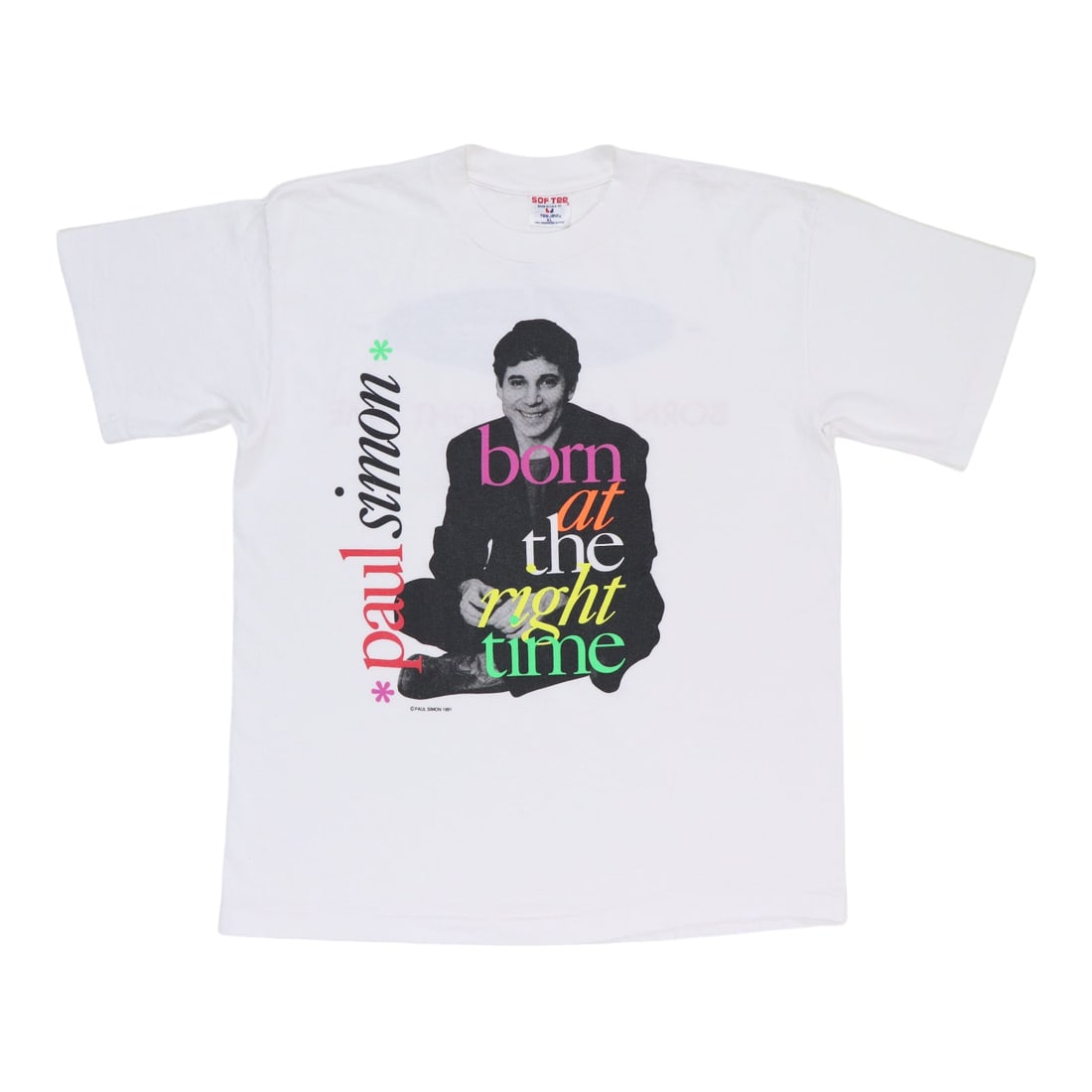 Vintage 1991 Paul Simon Tour T-Shirt Born At The Right Time Concert: Vintage 1991 Paul Simon Tour T-Shirt Born At The Right Time Concert This is an original vintage 1991 Paul Simon Born At The Right Time Tour shirt featuring front and back graphics. The shirt is made o