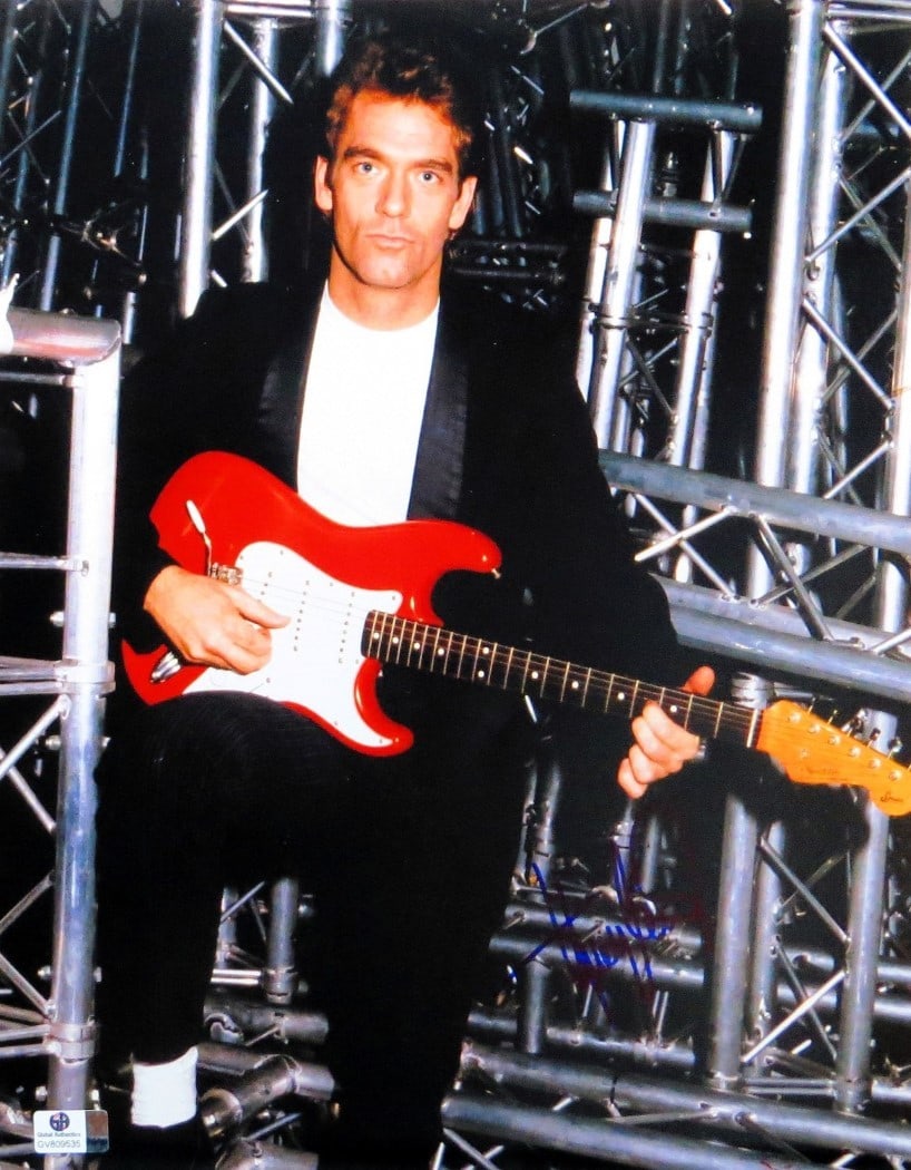 Huey Lewis Signed 11x14 Photo Guitarist Authenticated by Global Authentics: Huey Lewis Signed 11x14 Photo Guitarist Authenticated by Global Authentics This is an original autographed 11X14 photograph of Huey Lewis, the iconic singer known for his energetic performances and cl