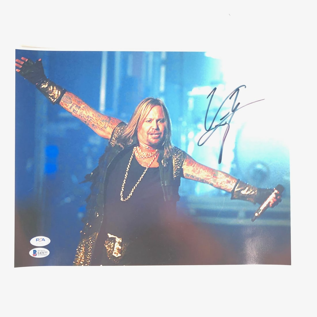 Vince Neil Autographed 11x14 Photo PSA/DNA Motley Crue Collectible: Vince Neil Autographed 11x14 Photo PSA/DNA Motley Crue Collectible This 11x14 photograph features the signature of Vince Neil, the iconic lead vocalist of the legendary heavy metal band Motley Crue. T