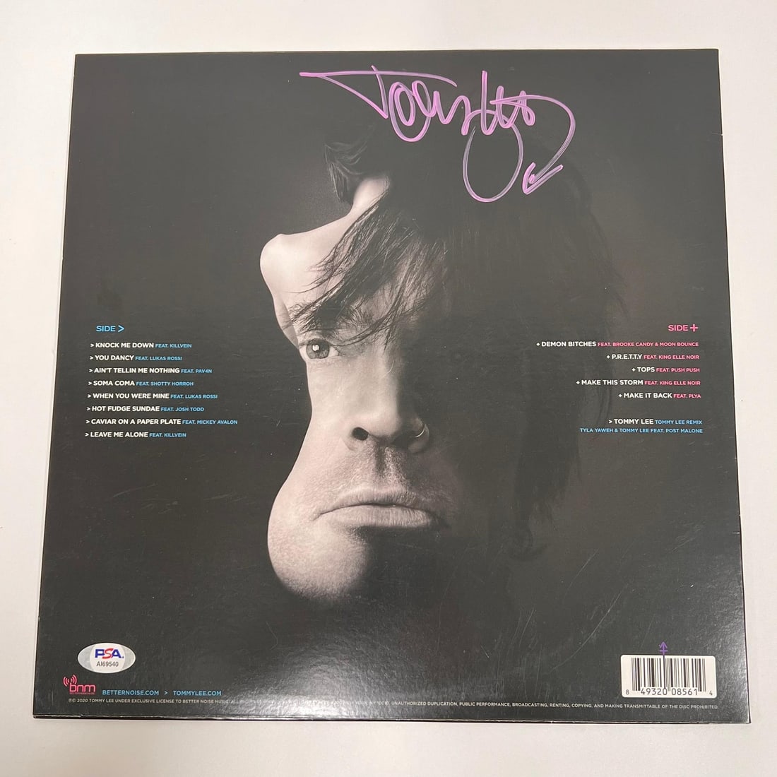 Tommy Lee Autographed Andro Vinyl Album PSA/DNA Certified: Tommy Lee Autographed Andro Vinyl Album PSA/DNA Certified This is an original Andro Vinyl Album cover autographed by Tommy Lee. The signature has been authenticated by PSA/DNA, ensuring its authentici