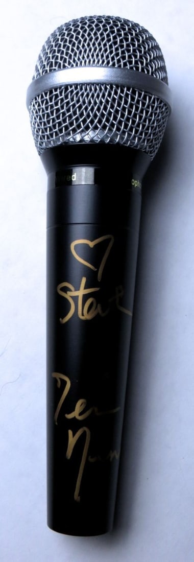 Autographed Microphone Terri Nunn Berlin Singer JSA Authenticated: Autographed Microphone Terri Nunn Berlin Singer JSA Authenticated This is an original microphone autographed by Terri Nunn, the lead singer of Berlin. The autograph has been authenticated by James Spe