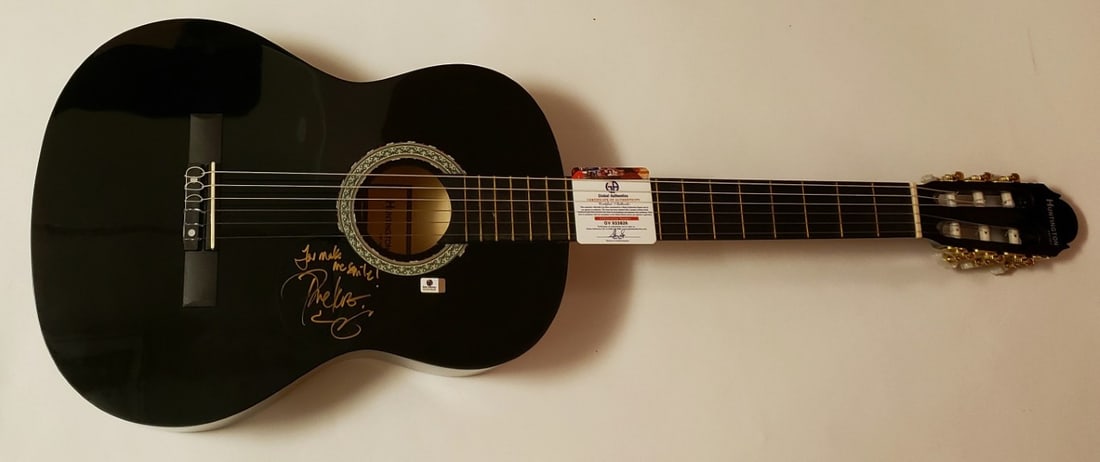 Dave Koz signed black acoustic guitar with Global Authentics: Dave Koz signed black acoustic guitar with Global Authentics This black acoustic guitar has been hand-signed by Dave Koz. The autograph is authenticated by Global Authentics (GAI). The guitar comes wi