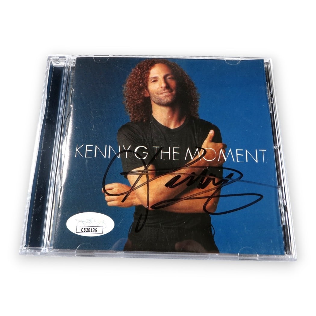 Kenny G Autographed CD Booklet The Moment JSA Authenticated: Kenny G Autographed CD Booklet The Moment JSA Authenticated This is an original autographed CD booklet of Kenny G's album "The Moment." The item includes the CD, though it has not been tested. It come